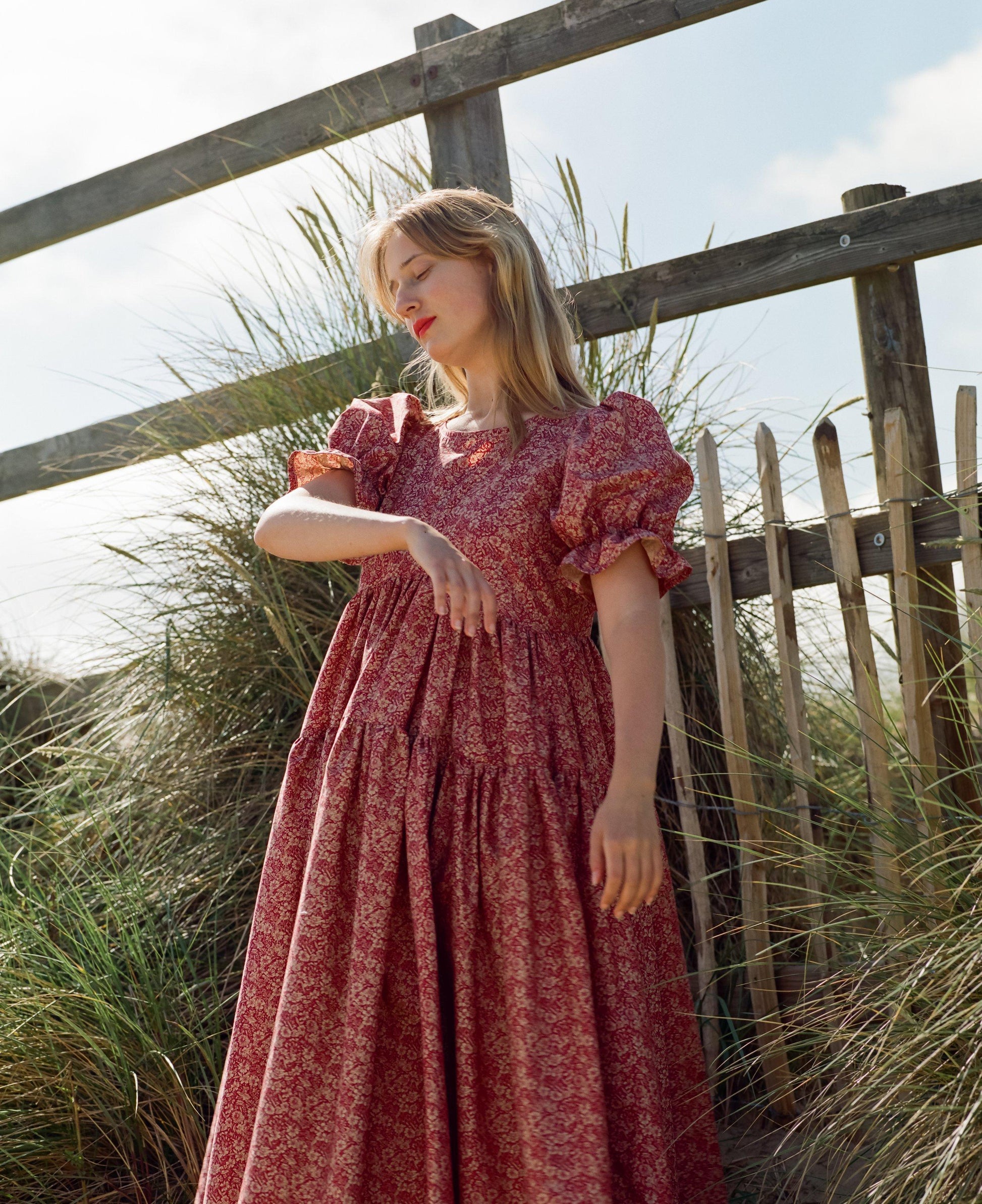 Cecilie Bahnsen inspired cotton dress in red and pink floral poplin. Handmade to order by seamstresses in the UK.