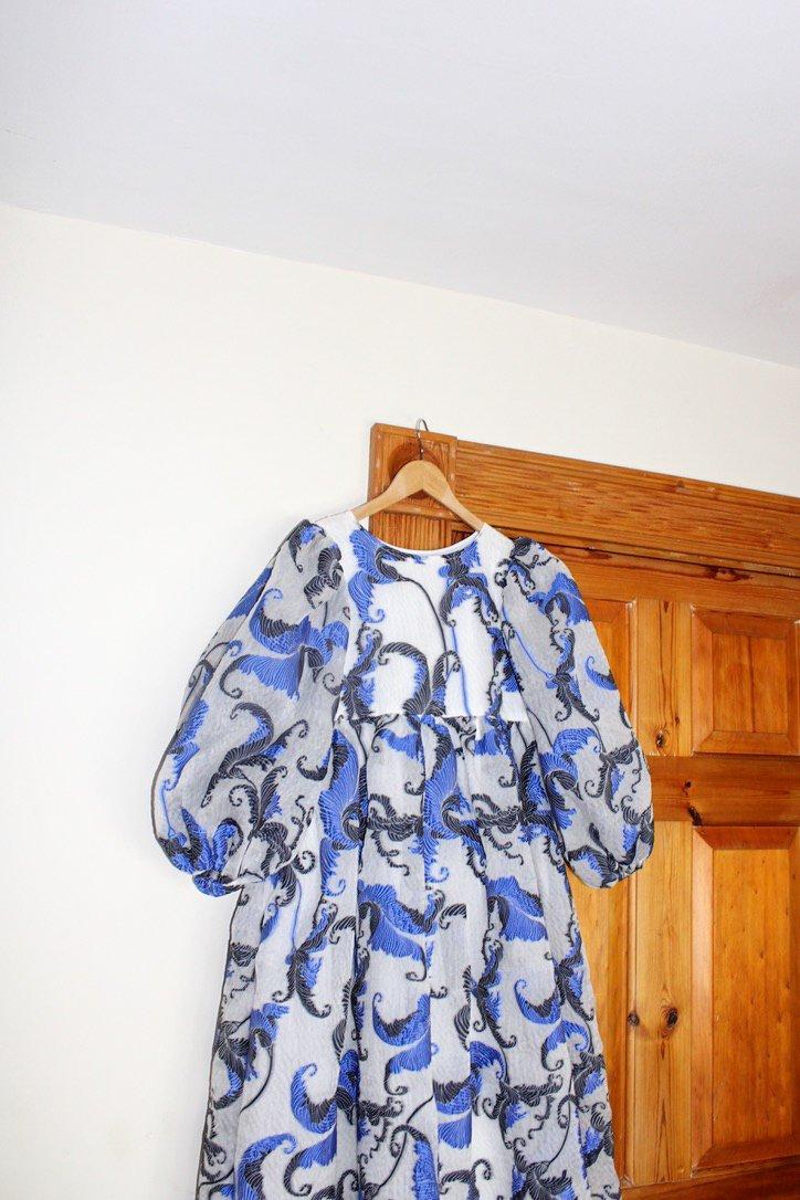 Hanging dress picture of blue organza lined dress